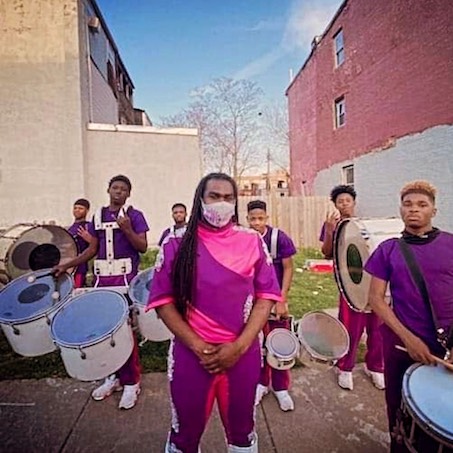 Baltimore Knockers posing with drums.